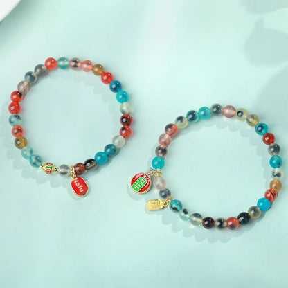 Women's natural agate bracelet with copper coin snake elements in geometric design
