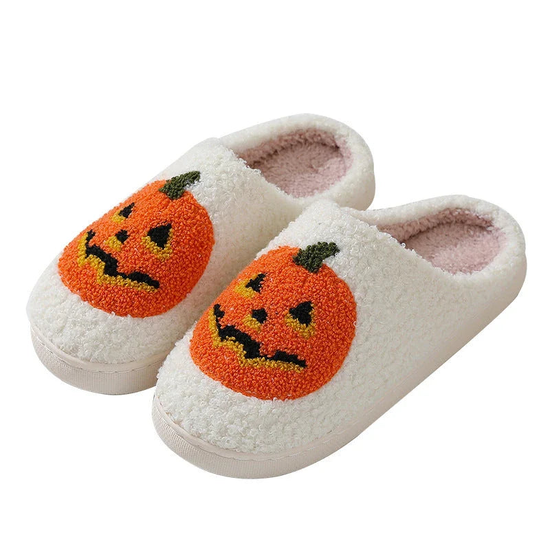 Pumpkin-shaped slippers in white and black colors, featuring a cozy cotton lining and non-slip rubber sole for comfortable indoor wear.