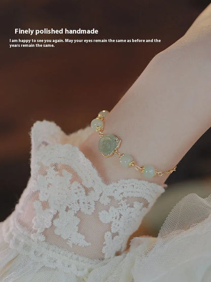 Hetian jade rose women's bracelet with 14K gold gilding and floral design