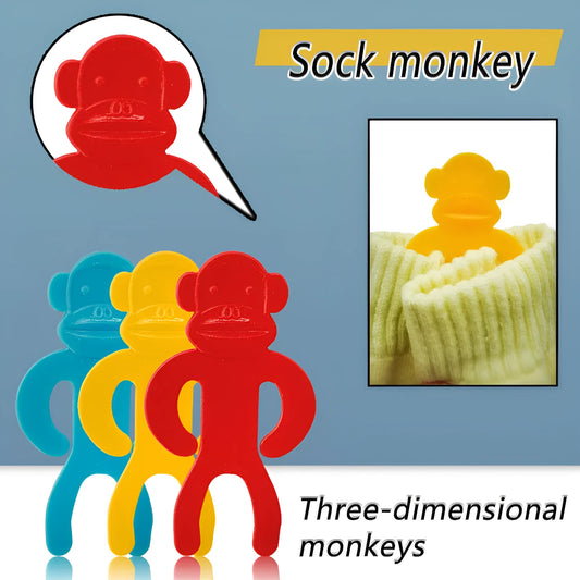 Set of blue, red, and yellow plastic socks clips holding pairs of socks together for laundry organisation