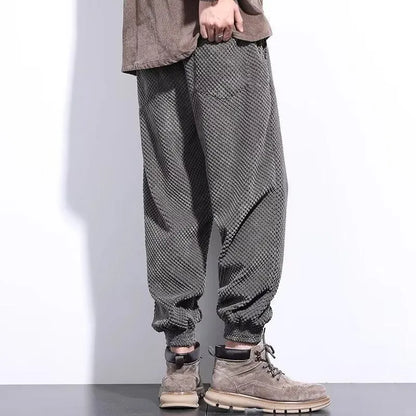 Men's grey casual sweatpants with ankle-tie design and straight leg cut