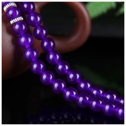 Purple chalcedony natural crystal bracelet with three-circle ethnic design on elastic cord