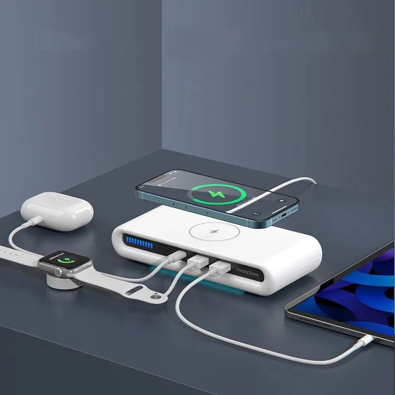 White desktop wireless charger with 15W fast charging and 8-colour atmosphere lamp on a wooden desk