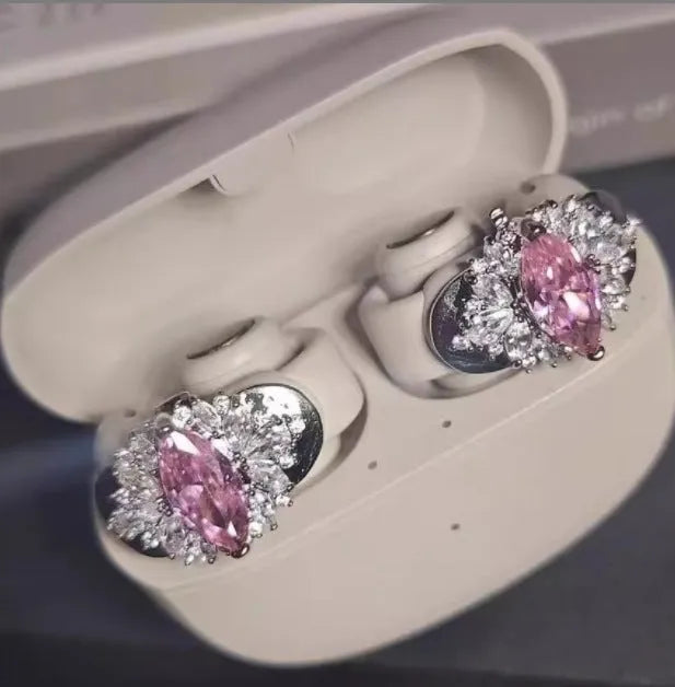 Zircon earphone clip in silver plate with electroplated finish, shown in pink, purple or gold with heart or geometric shape.