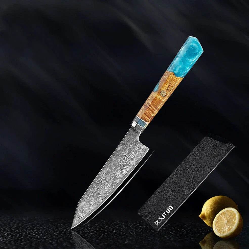 Six-piece Damascus steel kitchen knife set showing distinctive wave patterns on blades and pakkawood handles