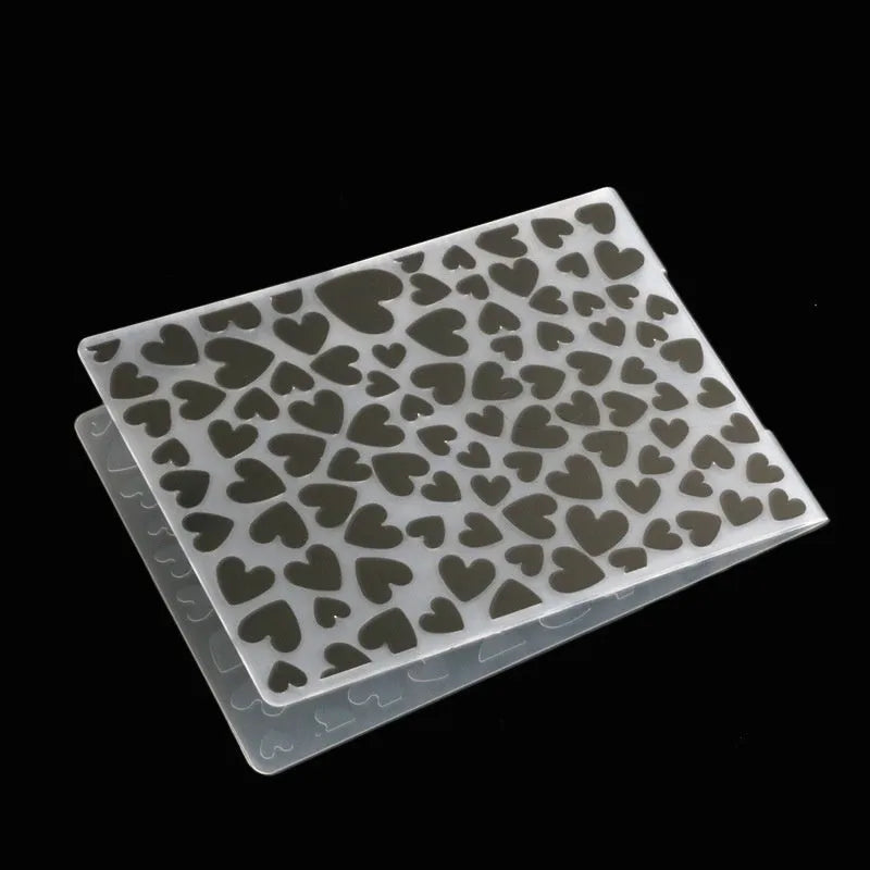 Set of ten plastic cake decorative moulds showing windmill, star, flower, and butterfly patterns.