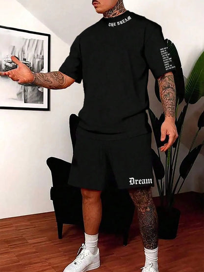 Man wearing a grey short-sleeve sports top and matching shorts from the quick-dry polyester set.