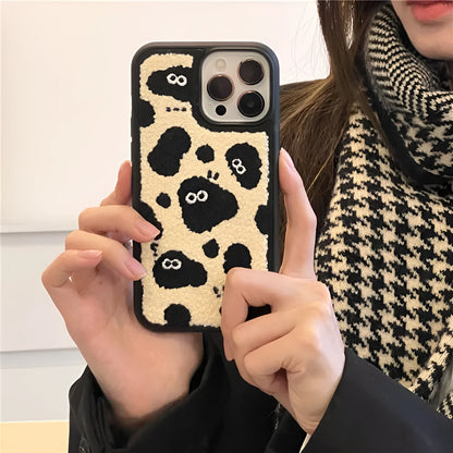 Black plush fairy character back cover case for Apple iPhone mobile phone.