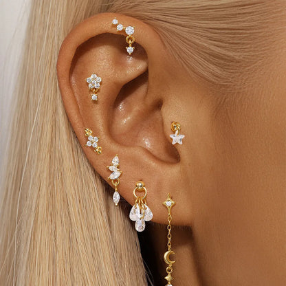 S925 sterling silver moon and star earrings with embedded diamond accents on a geometric design