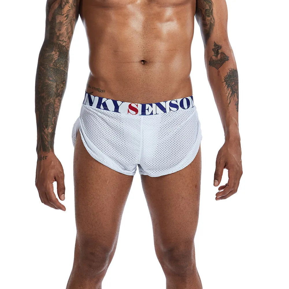 Breathable mesh men's boxer briefs in black, shown laid flat