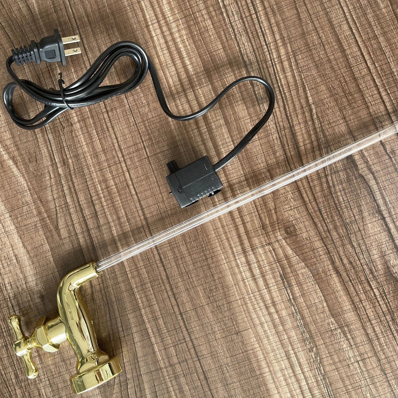 Decorative faucet-style outdoor fountain with LED lights, perfect for enhancing any patio, garden, or yard