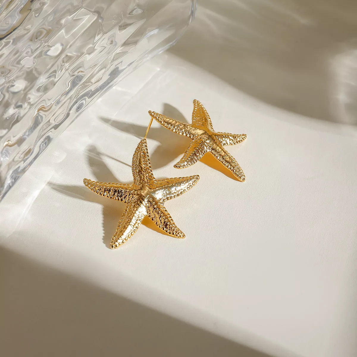 Serene Gold Starfish Earrings in stainless steel with gold electroplated finish