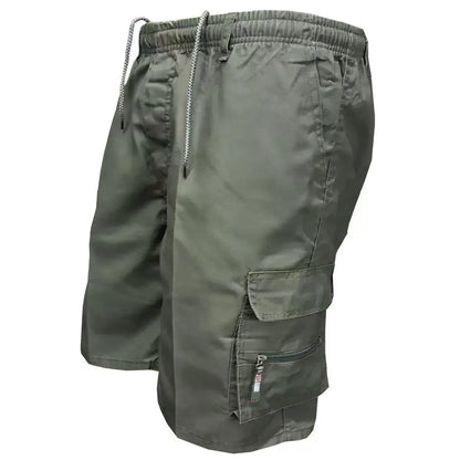 Man wearing loose-fit beige casual work pants with an elastic waistband.