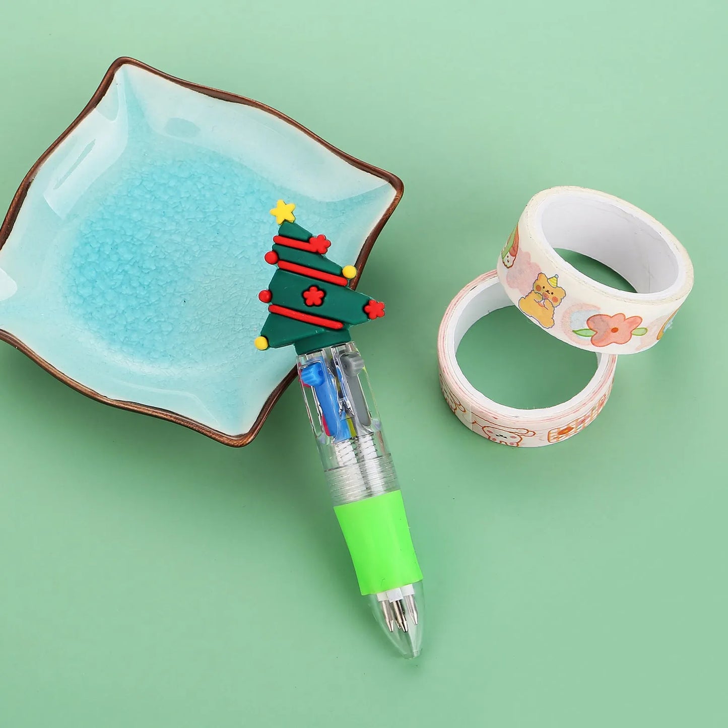 Christmas four-colour ballpoint pen with press mechanism showing festive designs