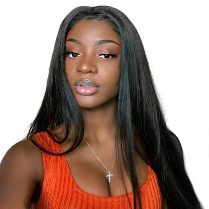 Long black straight synthetic wig on a stand, showing centre parting and full fringe