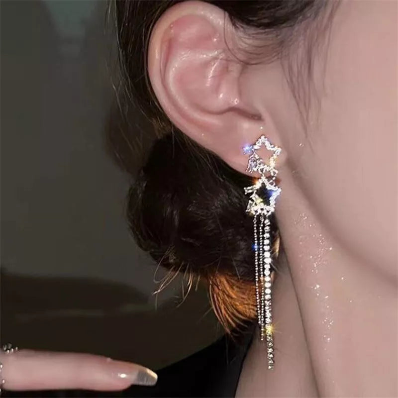 XINGX Water Drop Tassel Earrings in gold alloy with geometric design