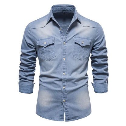 Men's solid colour slim fit cotton denim shirt with long sleeves and button front.