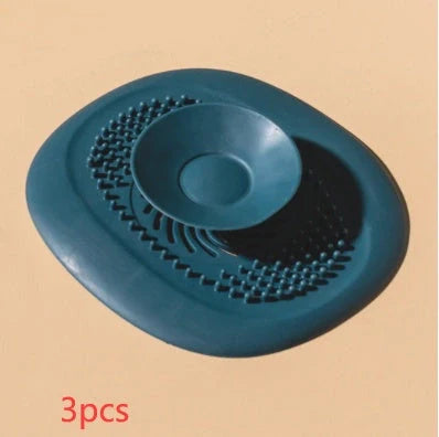 TPR vortex design sink drain cover in twilight orange, quiet blue, mango yellow, and gentian green