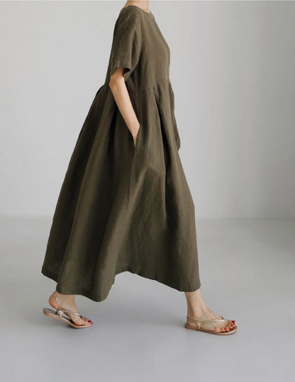 Comfortable cotton linen round neck dress in navy blue, army green, and apricot colors, perfect for casual wear.
