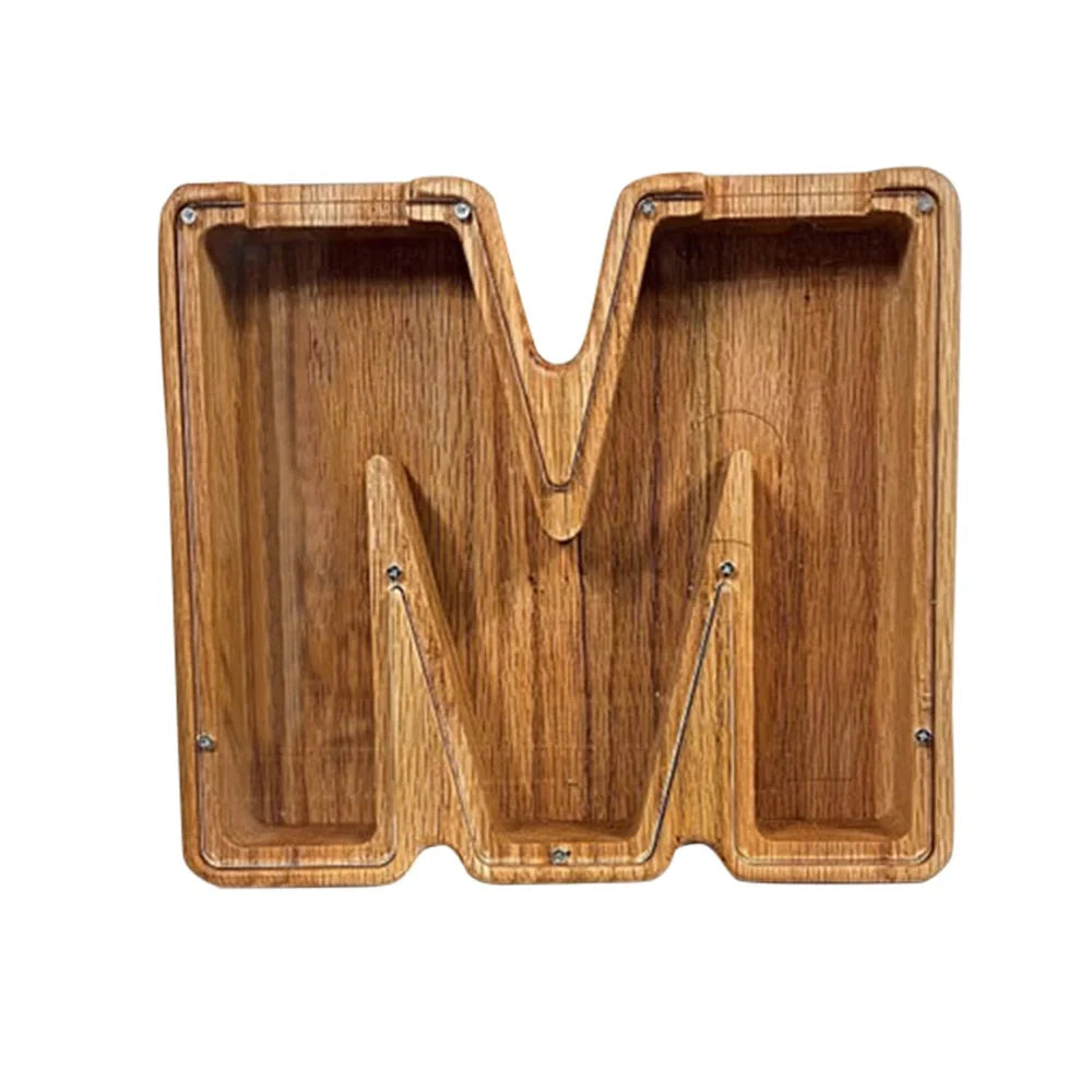 Handmade wooden letter piggy bank with personalised initial, showing 15cm height and 5cm coin slot for UK coins