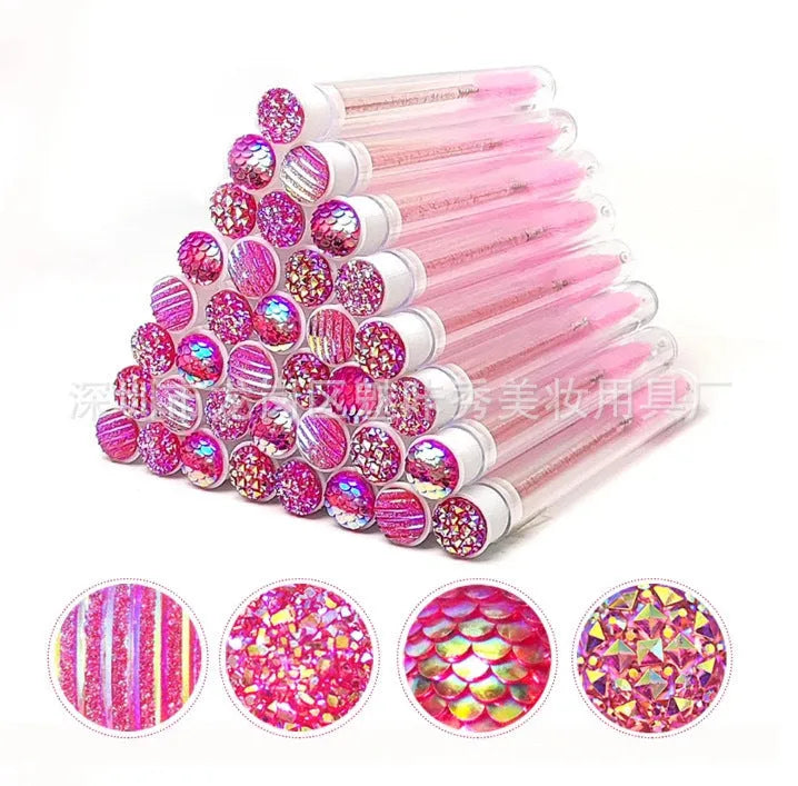 Disposable eyelash brushes in plastic storage tubes with spiral brush heads in four colours