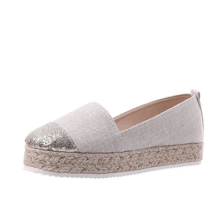 Breathable canvas slip-on flat shoes in black and white colours on a size chart showing 35 to 43.