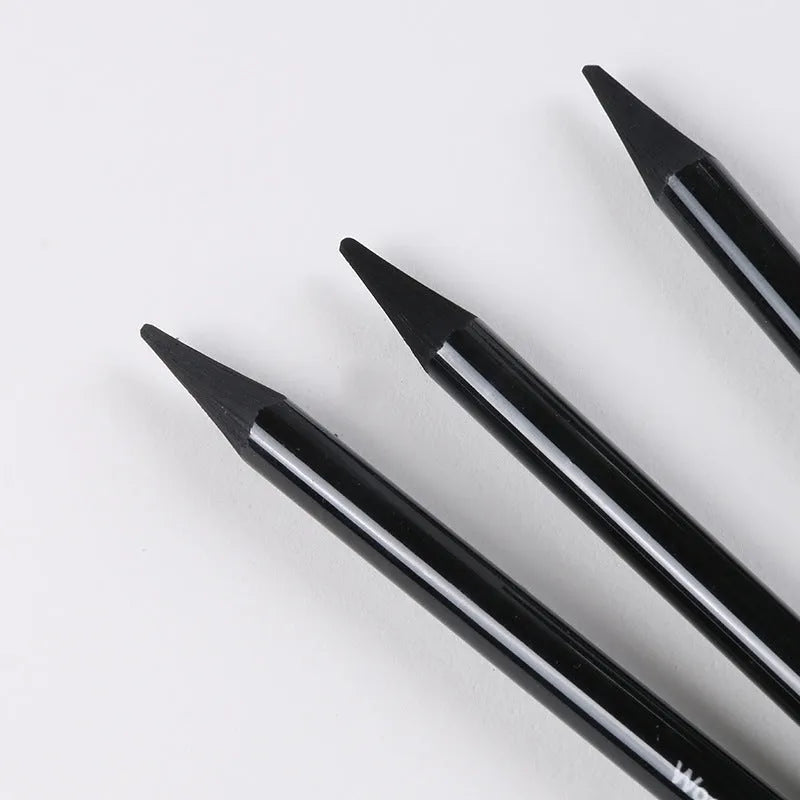 Carbonized Pencil Suit with six graphite and three carbonized pencils on suction card packaging