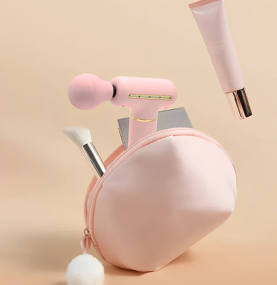 Green portable massage gun showing 20cm length with USB charging port and intensity controls