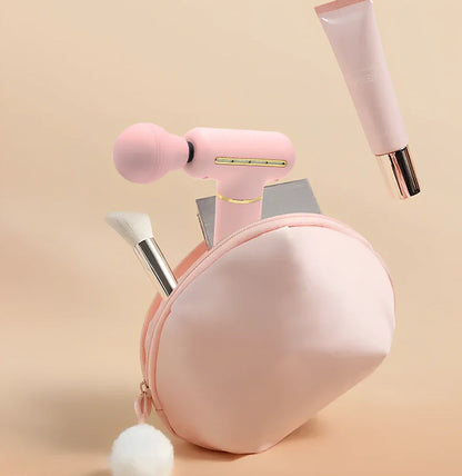 Green portable massage gun showing 20cm length with USB charging port and intensity controls