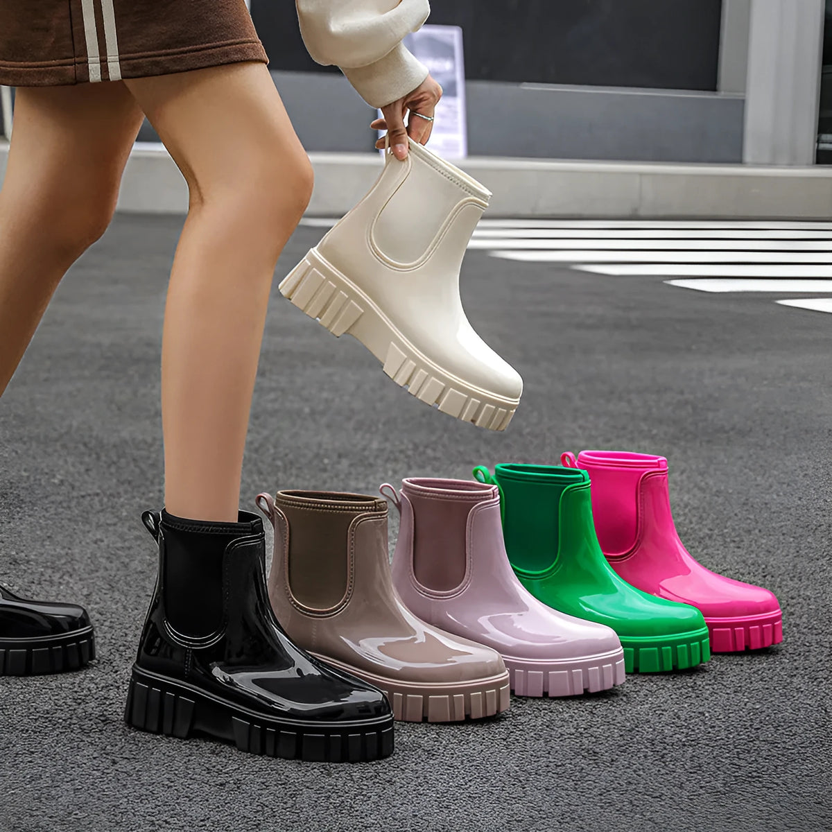 PVC low tube rain boots in apricot colour with non-slip sole and flat heel design