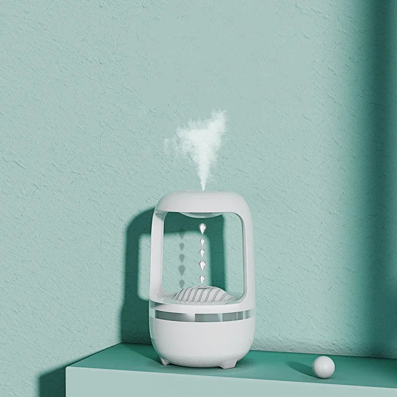 Anti gravity water drop humidifier in white or black, 120x120x229mm, USB powered, with atmosphere lamp.