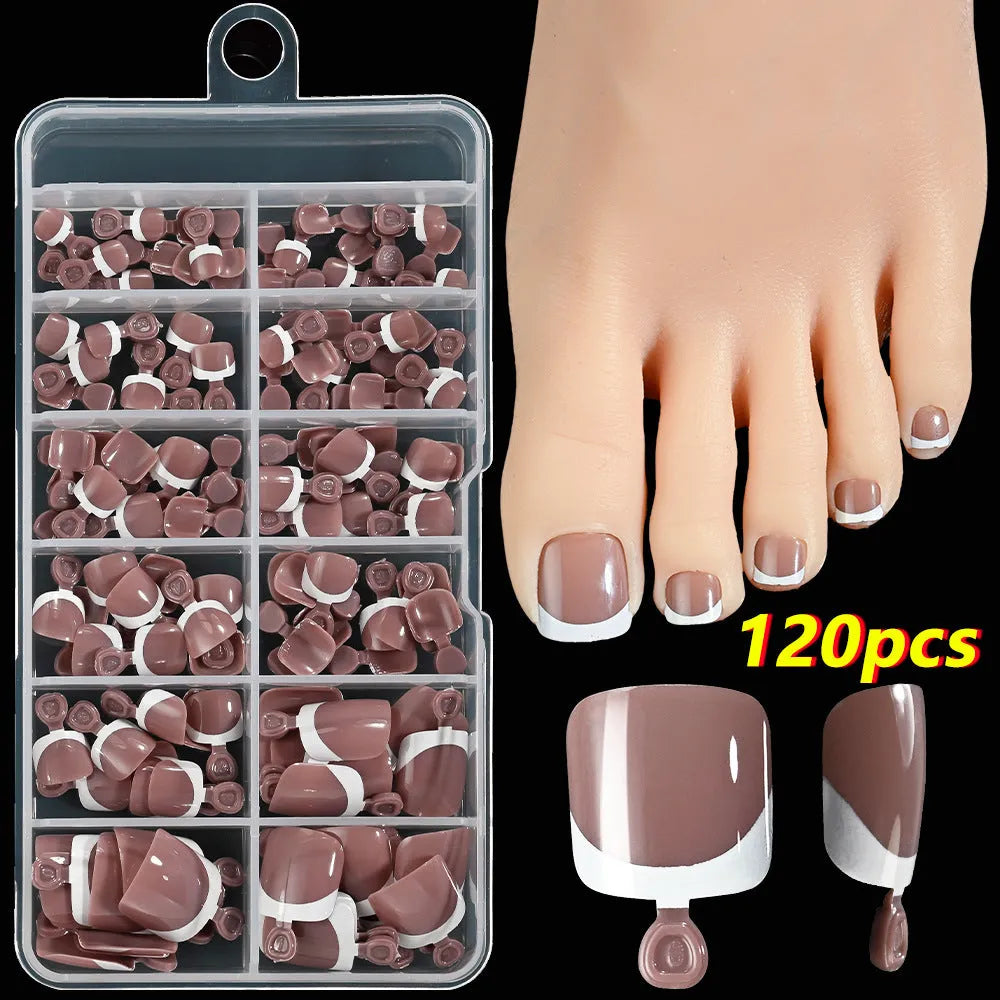 Box of 120 full square short artificial nail tips with French white edges in multiple nude shades.