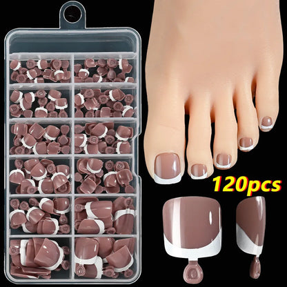 Box of 120 full square short artificial nail tips with French white edges in multiple nude shades.