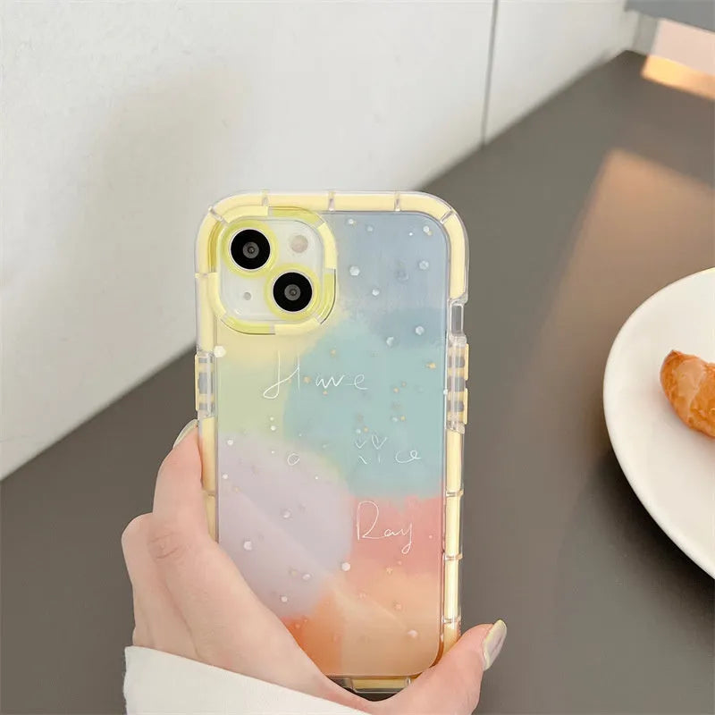 Minimalist silicone phone case for iPhone 14 with a yellow contrast edge on a white background.