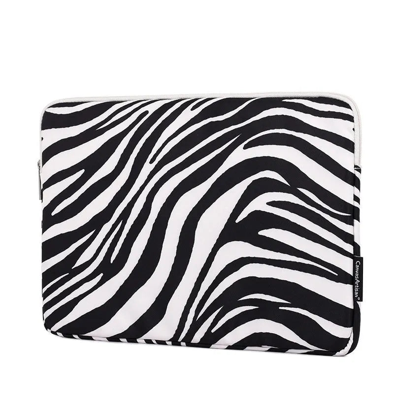 Black and white zebra pattern polyester protective sleeve for a digital notebook, available in 11 to 17 inch sizes