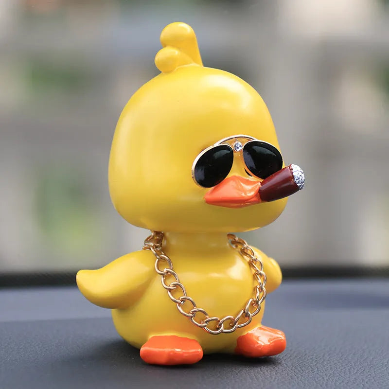 Little yellow duck resin car interior ornament in social duck poses with gold glasses and gold necklace