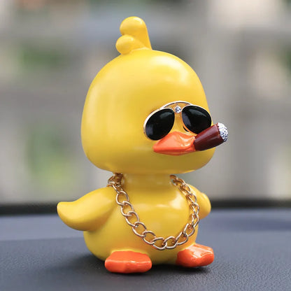 Little yellow duck resin car interior ornament in social duck poses with gold glasses and gold necklace