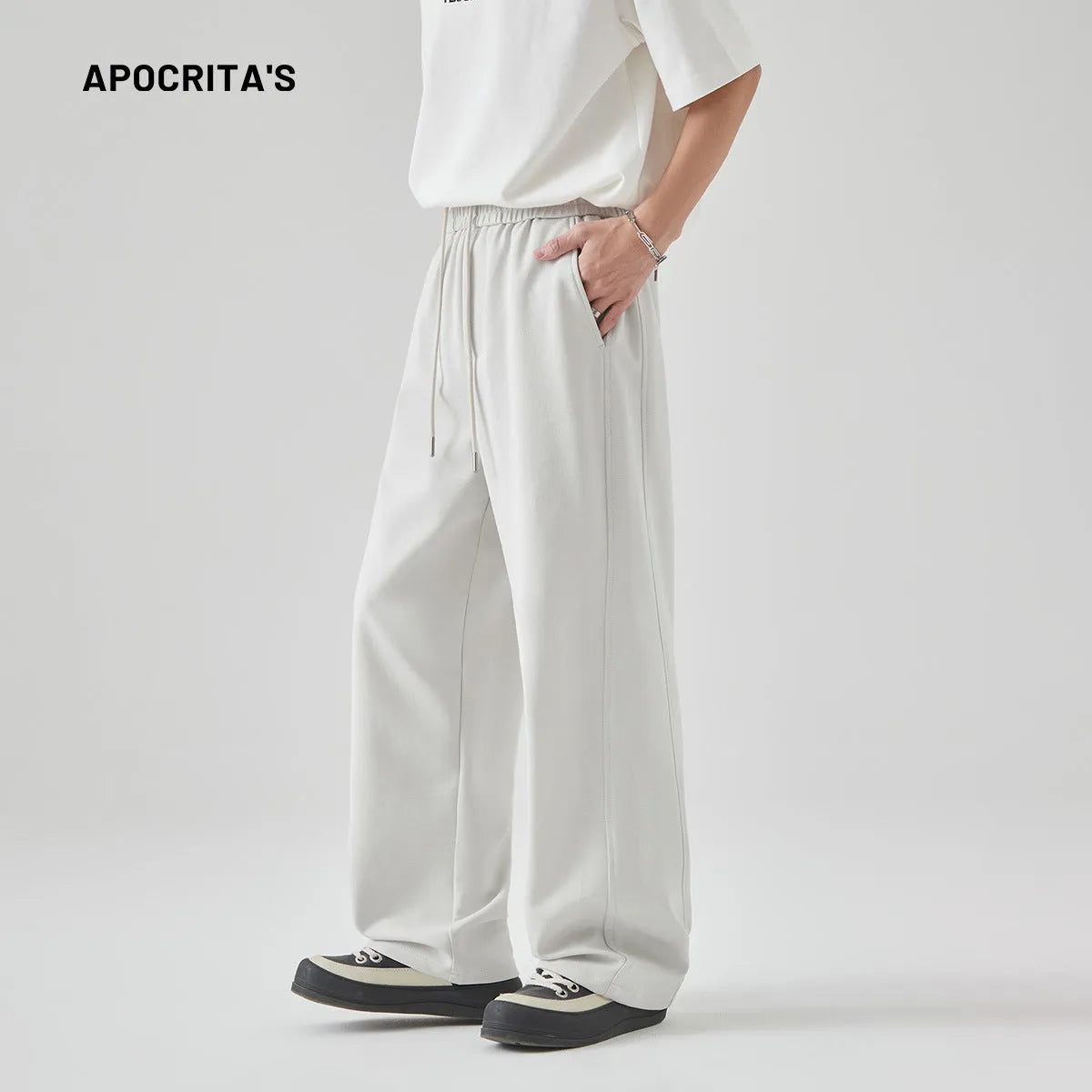 Men's grey cotton blend summer casual trousers with a high waist, straight leg, and front lace-up detail.