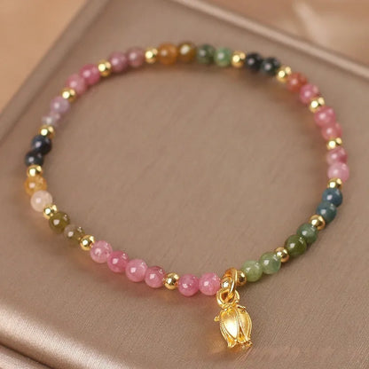 Natural Tourmaline flower anklet and bracelet for women showing beaded design and convertible jewellery functionality