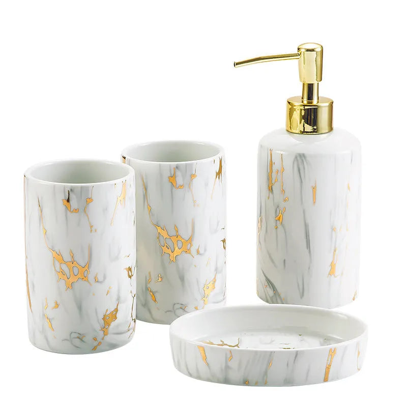 White ceramic bathroom wash kit set with cups, latex bottle and soap box in packaging.