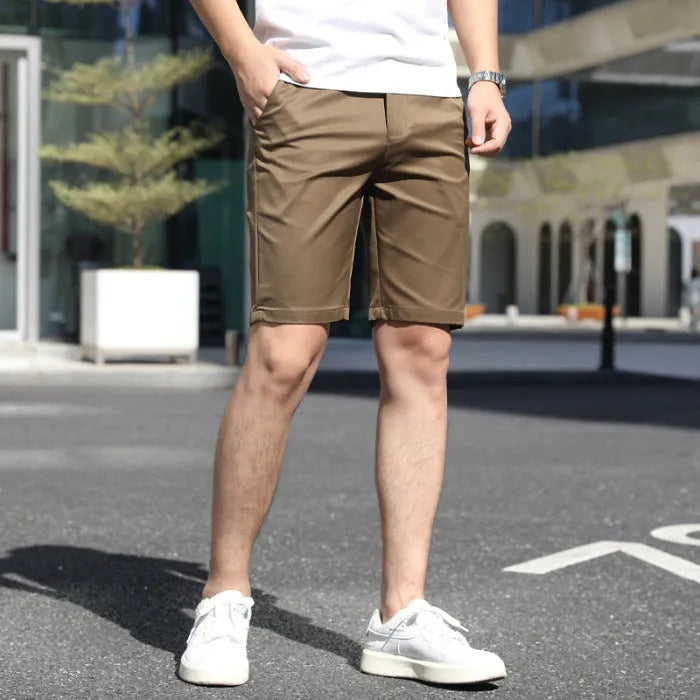 Men's loose elastic waistband fifth pants in solid colour casual styling