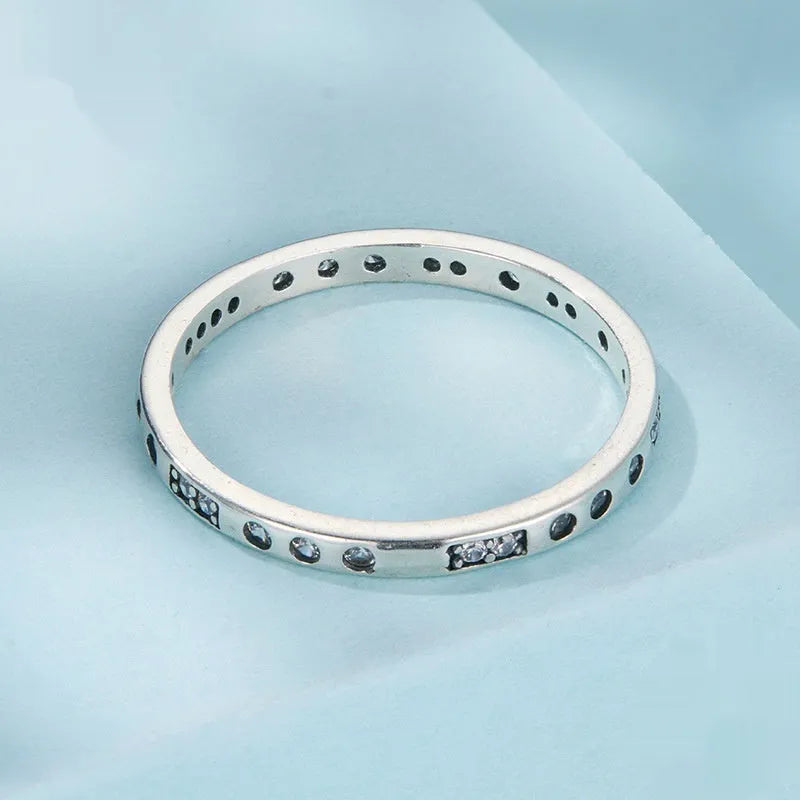Silver-coloured alloy Moss Password I Love You ring with an oxidised black finish on a simple bracelet band.