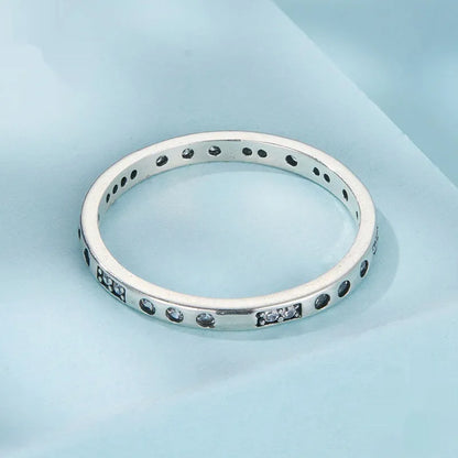 Silver-coloured alloy Moss Password I Love You ring with an oxidised black finish on a simple bracelet band.