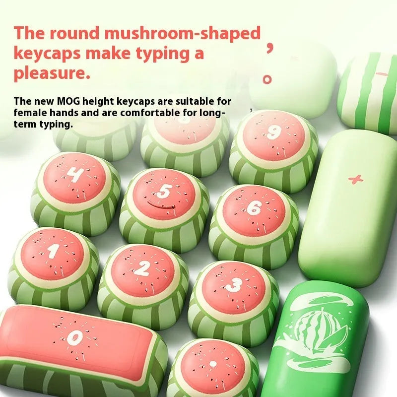 Set of 138 watermelon-themed PBT key caps with green, red, and black dye-sublimated design, shown on a mechanical keyboard.