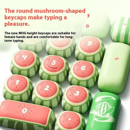 Set of 138 watermelon-themed PBT key caps with green, red, and black dye-sublimated design, shown on a mechanical keyboard.