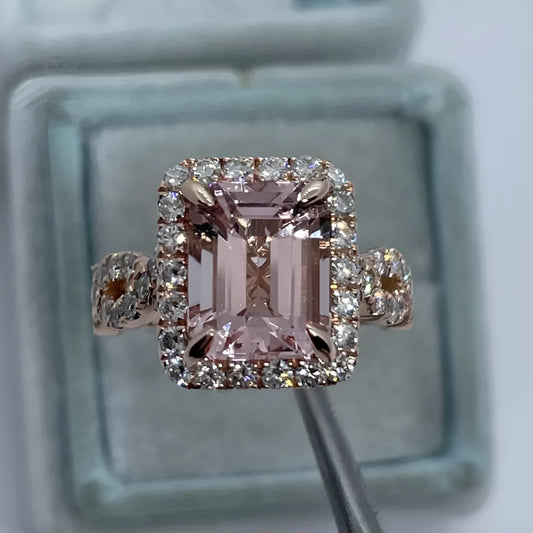 Rose gold electroplated geometric alloy ring on a white background.