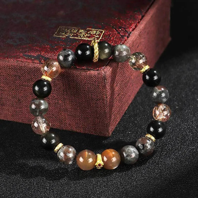 Handcrafted black Sunstone flame stone Wukong bracelet on wrist showing stone bead detail