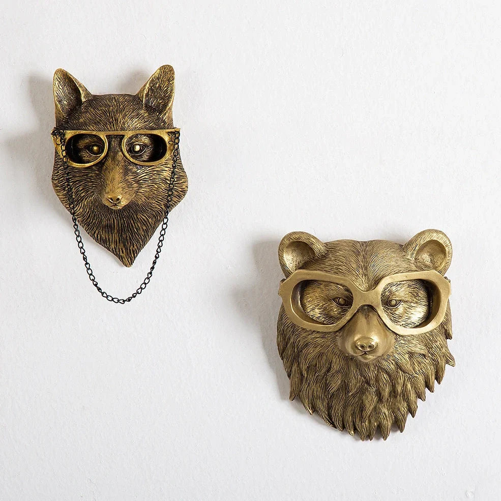 Antique bronze animal pendant showing bear design with synthetic resin construction