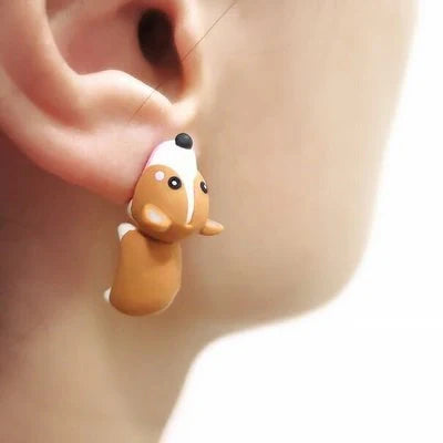 Funny animal bite earrings featuring dinosaur and whale designs in various colors