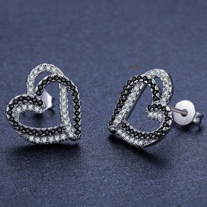Stylish copper heart-shaped earrings with a double buckle closure, a trendy and elegant fashion accessory